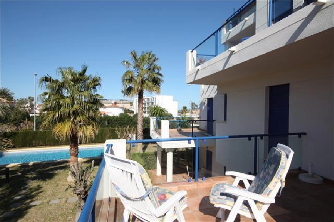 Balcony with view of the pool, near the beach